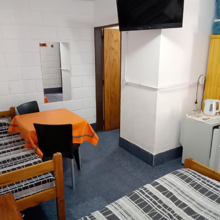 Hostería El Peregrino - Habitación Cuádruple con baño privado - 7