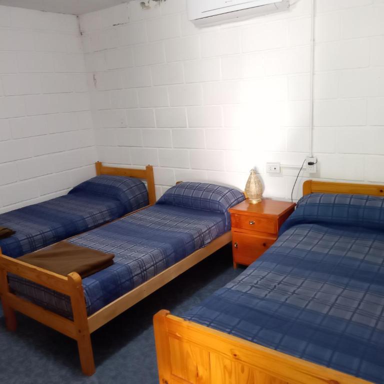 Hostería El Peregrino - Habitación Cuádruple con baño privado - 9