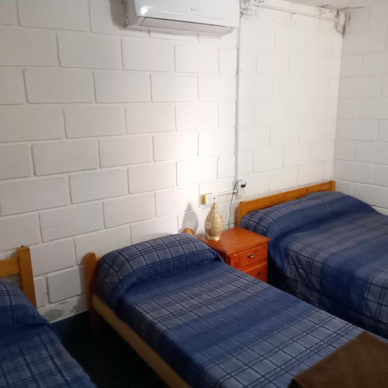 Hostería El Peregrino - Habitación Cuádruple con baño privado - 10