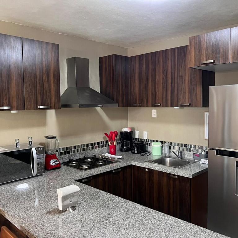 Centrally located apartment with AC, parking and pool - Two-Bedroom Apartment - 30