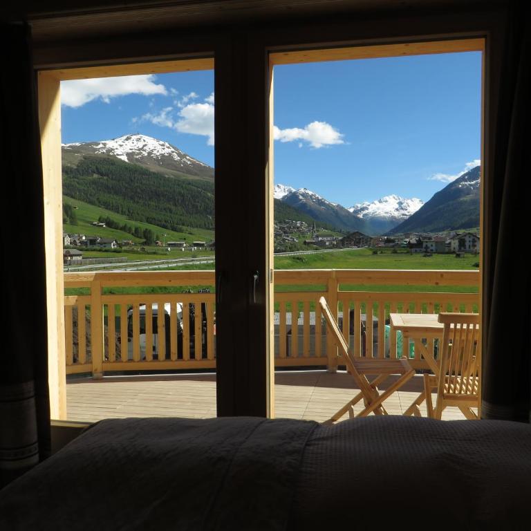 B&B Ecohotel Chalet des Alpes - Camera Matrimoniale/Doppia con Letti Singoli con Letto Supplementare - 14
