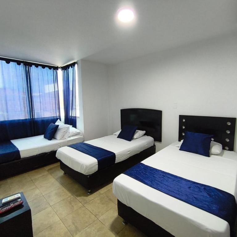 Hotel Konfort Inn - Habitación Triple - 4