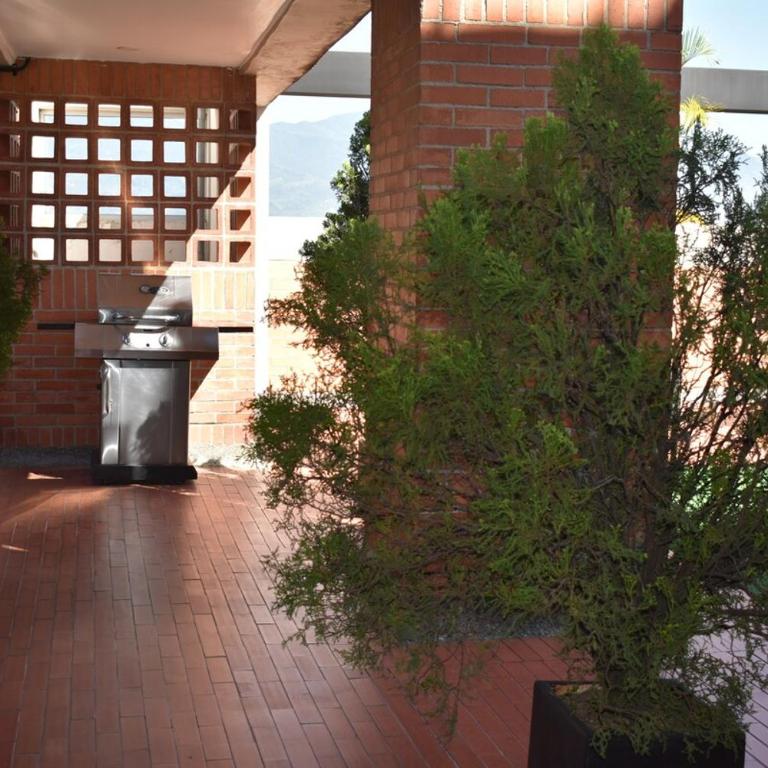 Loft comodo y central con AC y Terraza propia en Astorga Poblado - One-Bedroom Apartment - 32