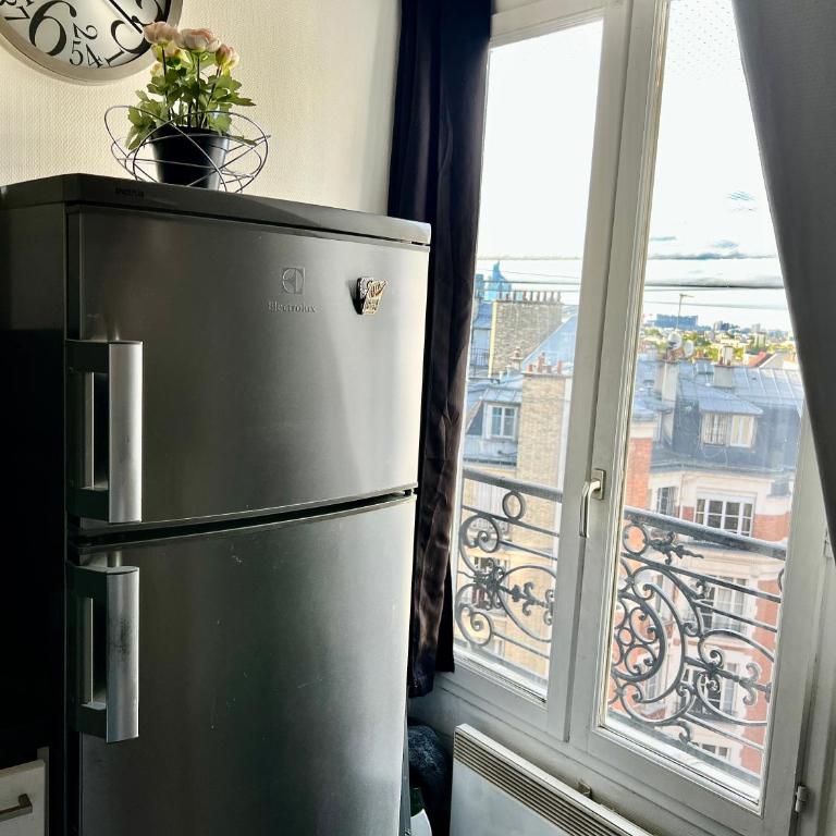 Studio Haut Haut de Gamme - Bain de lumière - Vue sur Paris - Appartement 1 Chambre - 25