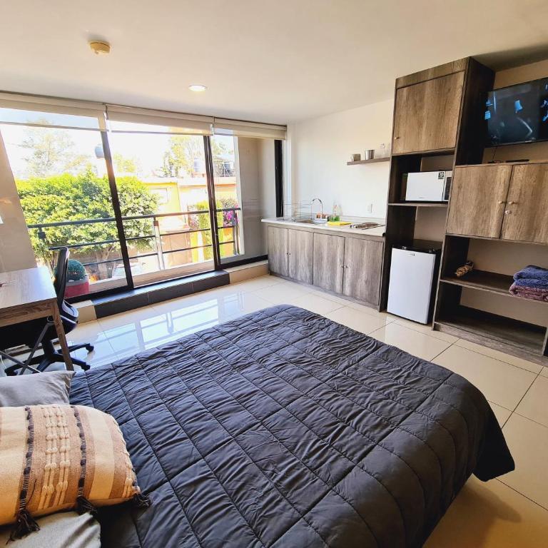 S08 MASTER SUITE Premium TEC CEM con Cocineta WiFi Balcón Parking Terraza - One-Bedroom Apartment - 26