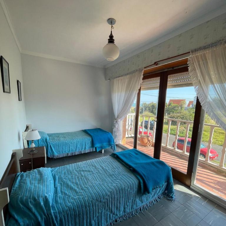 Casa a 100 metros de la playa - Four-Bedroom House - 8