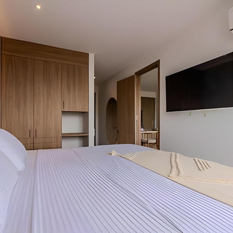 1 k Baia Kristal lujoso y nuevo 2 alcobas Prive 2 - Deluxe Two-Bedroom Apartment with Garden View - 11
