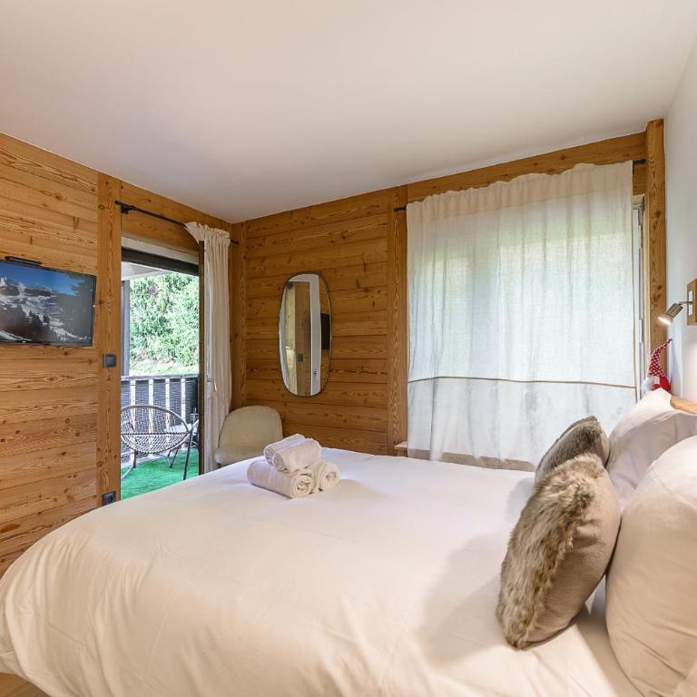 Les Balcons des Aravis - Prestigieux appartement au coeur de La Clusaz - Three-Bedroom Apartment with Balcony - 19