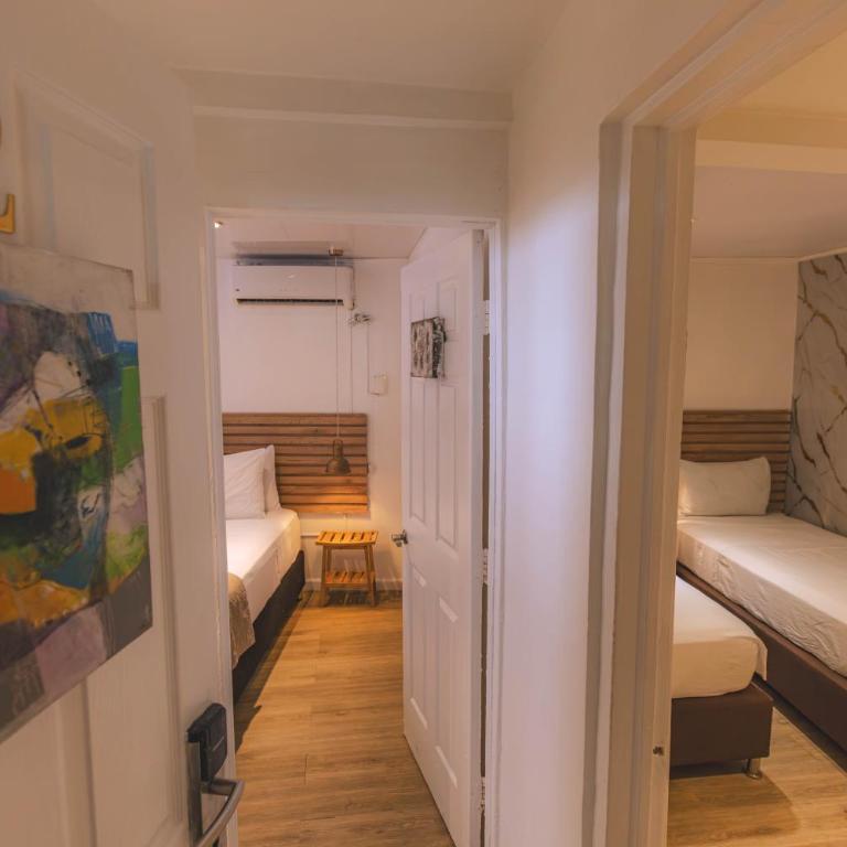 Ataraxy Hotel Boutique - Habitación Cuádruple Deluxe - 12