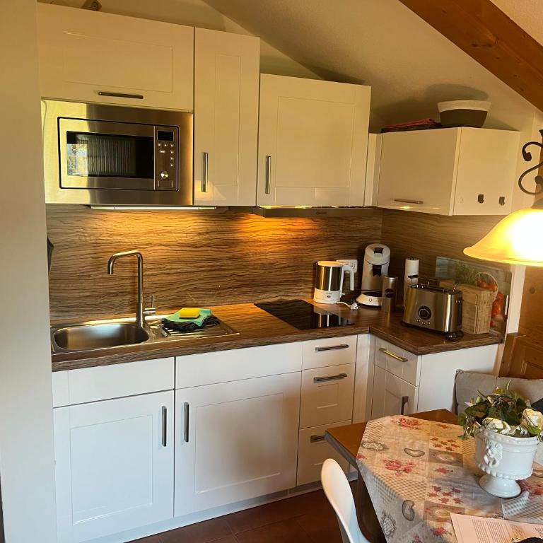 Ferienhaus Heimhof - Apartment mit 1 Schlafzimmer und Bergblick - 8