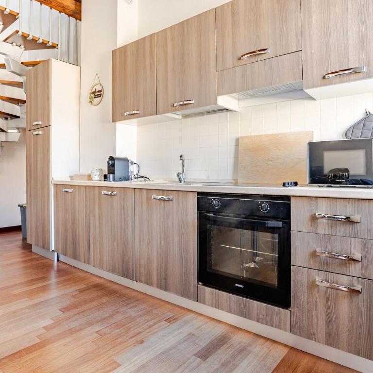 Rifugio d'incanto tra i tetti Estensi - Two-Bedroom Apartment - 7