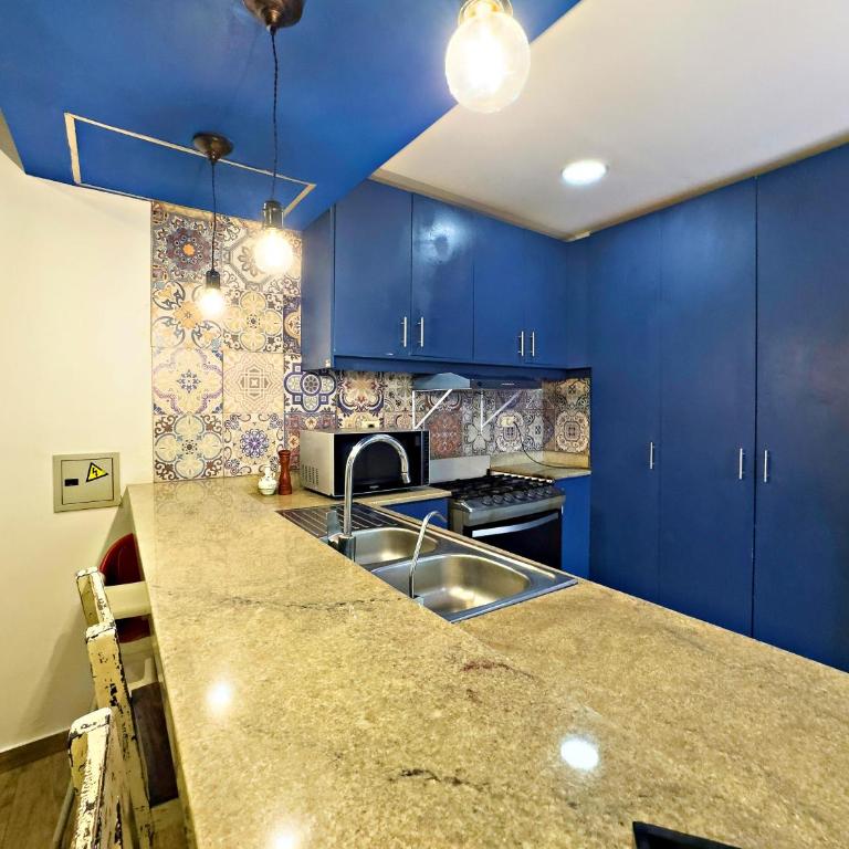 Casa estilo americano cerca del Shopping Mariscal con 2 garajes y WiFi - Two-Bedroom Townhouse - 25