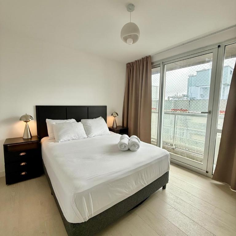 MarDelSuites - Departamento Moderno Deluxe Piso 11 - Pileta, Cochera, AC, 2min Playa - One-Bedroom Apartment with Balcony and City View - 10