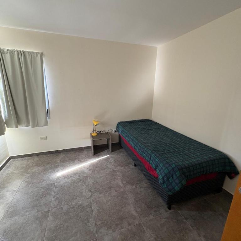 Duplex confortable en Caleta Olivia - Two-Bedroom Apartment with Balcony - 7