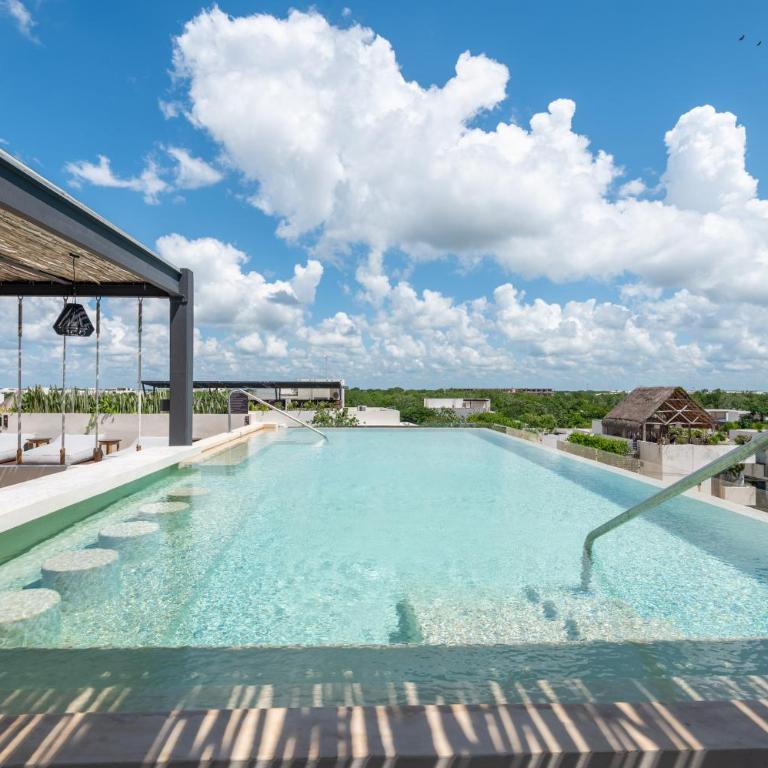 Modern Retreat with Private Garden and Jacuzzi - Two-Bedroom Apartment - 1