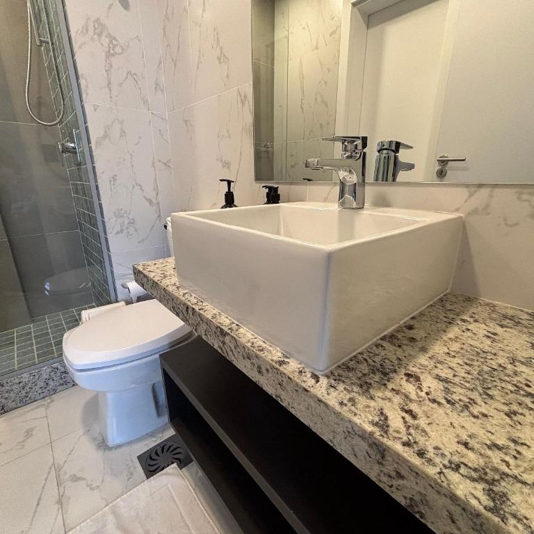 1D moderno • Centro financiero • Wi-Fi & A/C - Apartamento de 1 dormitorio - 6