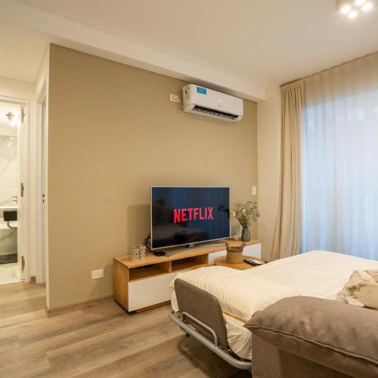 Cómodo, con cochera cerca del hospital italiano - Apartamento de 1 dormitorio - 38