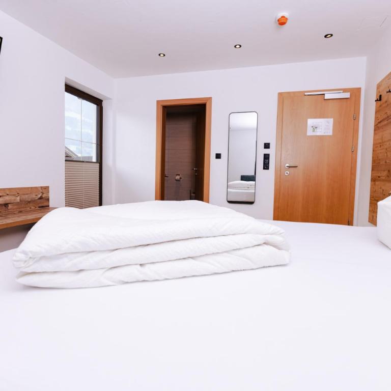 Gasthof Aigner *** - Deluxe Doppelzimmer mit Balkon - 7