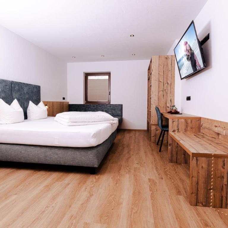 Gasthof Aigner *** - Deluxe Doppelzimmer mit Balkon - 4
