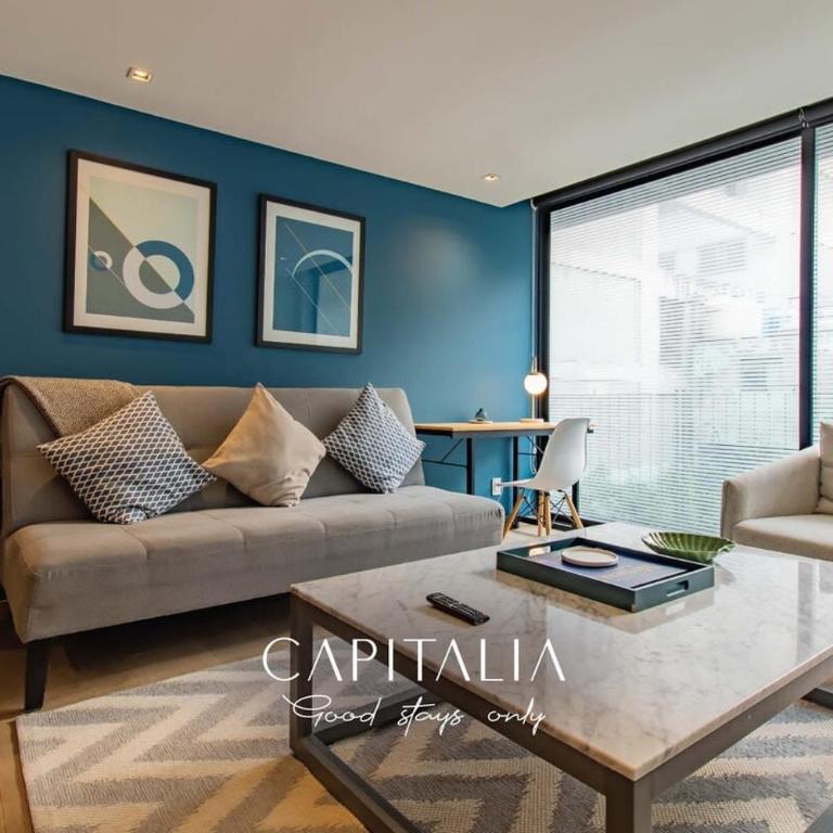 Capitalia Chic 1BR Comfort in Prime Location - Apartment - 1