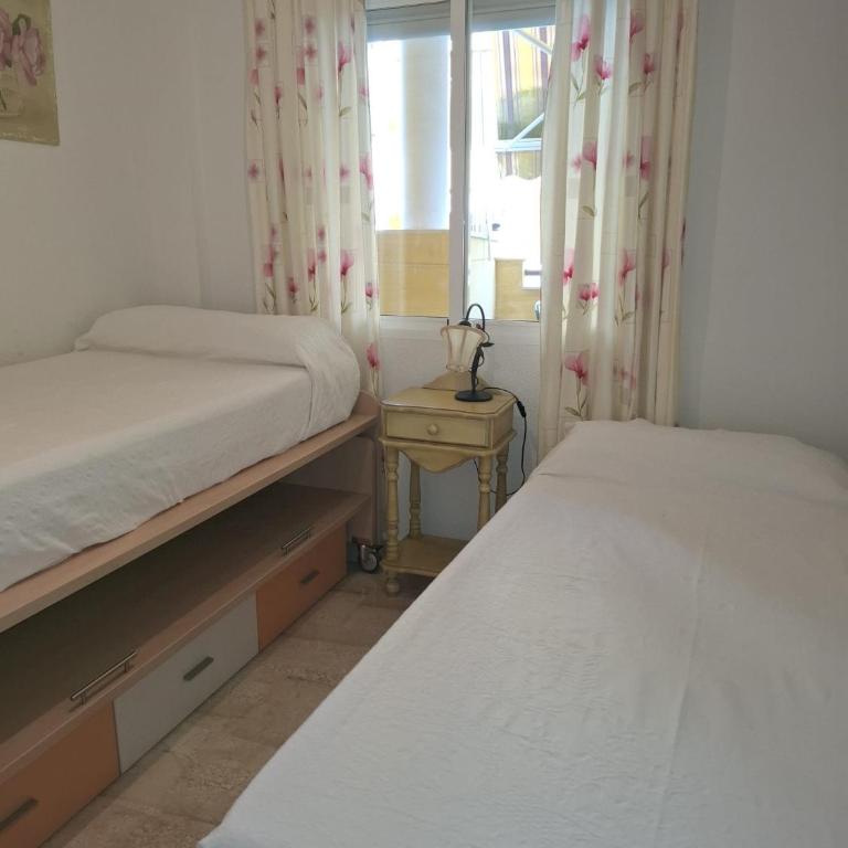 Bajo con jardín en Cascadas de las Marina - Two-Bedroom Apartment - 6