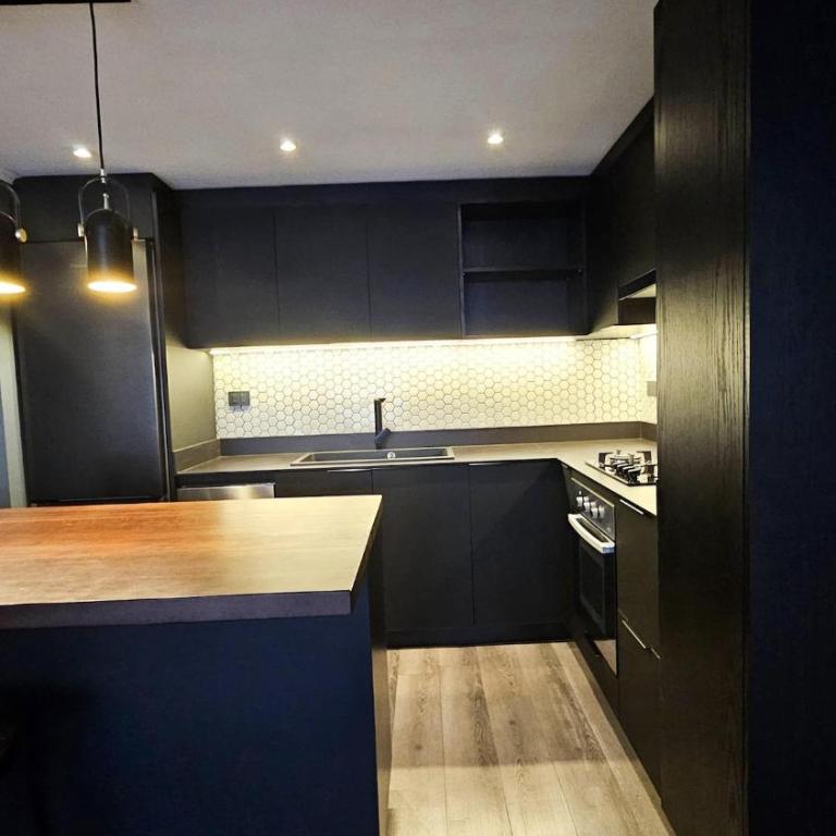 Descanso en el corazón de El Golf - Two-Bedroom Apartment - 23