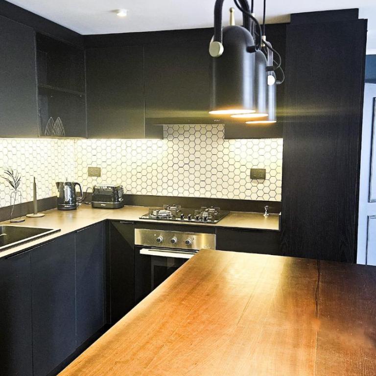 Descanso en el corazón de El Golf - Two-Bedroom Apartment - 27