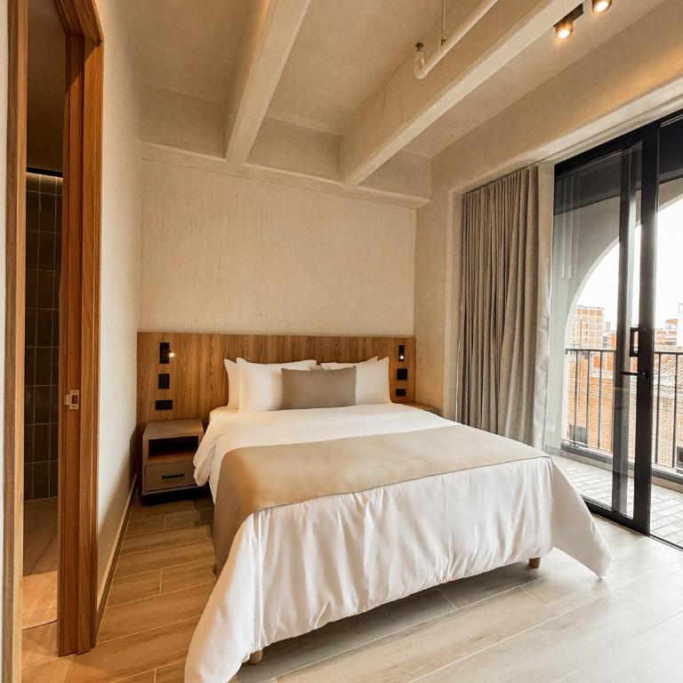 Hotel Tres Altares Sabaneta - Habitación Doble Deluxe con balcón - 2