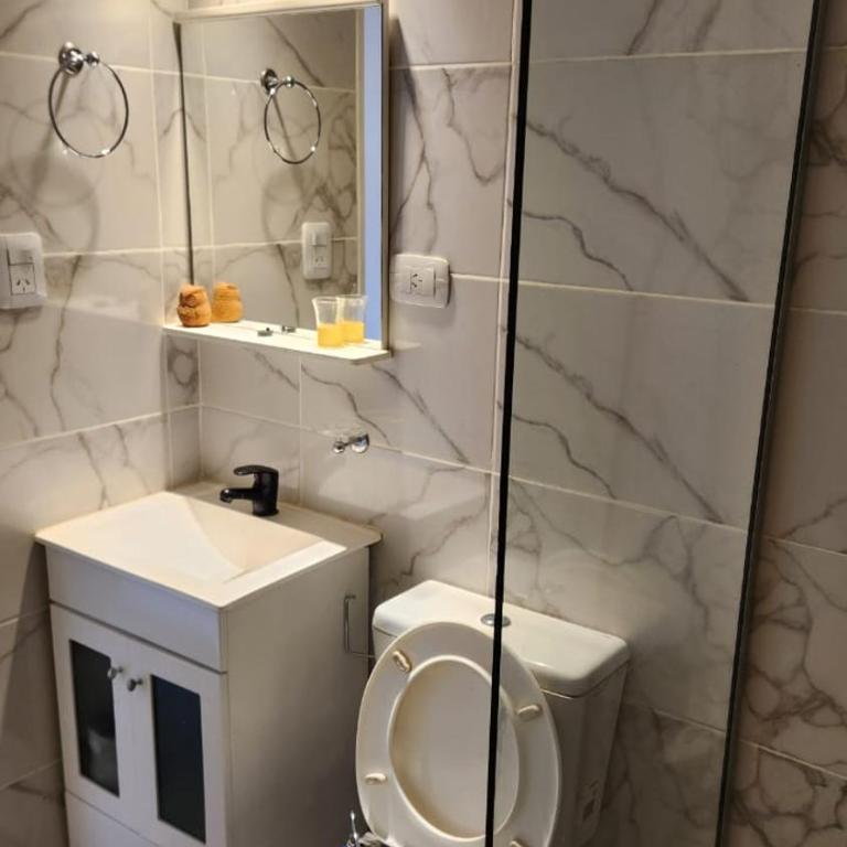 Centro de Cordoba 2 dormitorios parking con costo en planta baja - Apartamento de 1 dormitorio - 14