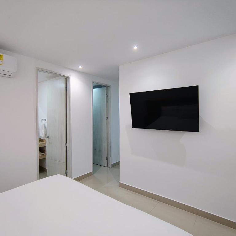 Apartamentos Amoblados-Atlantis Suites Bquilla - Habitación Deluxe con cama extragrande - 19