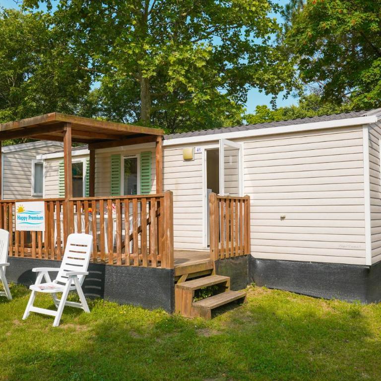Happy Camp mobile homes in Camping Sènia Cala Canyelles - Casa Móvil Premium - 1