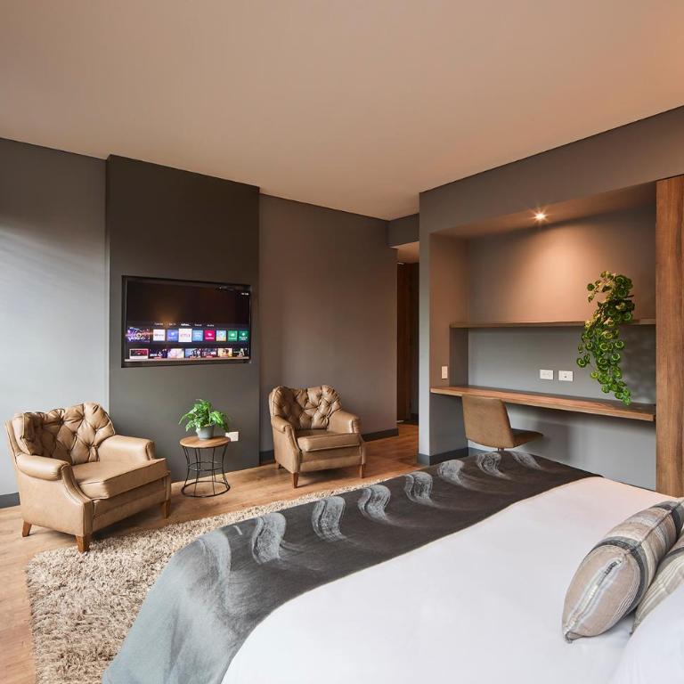 Nico Apartasuites - Deluxe Double Room - 9