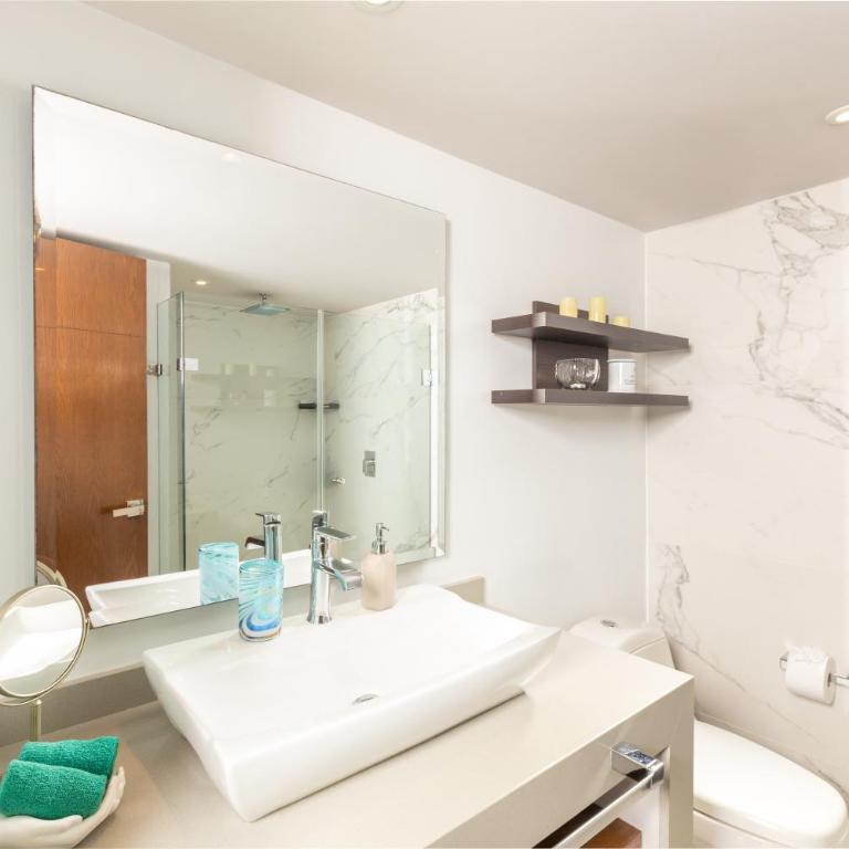 Luxury 2-Bedroom Beachfront Oasis – Two Balconies to Soak in the Views - Two-Bedroom Apartment - 25