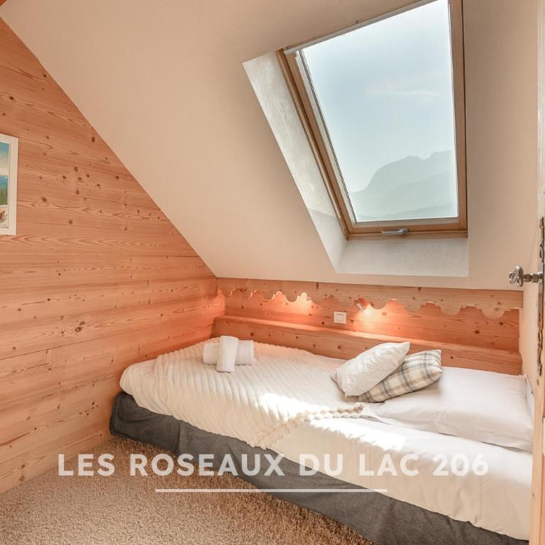 Les Roseaux du Lac - 7 appartements situés dans une résidence posée au bord du lac d'Annecy - Appartement 3 Chambres - Vue sur Lac - 11