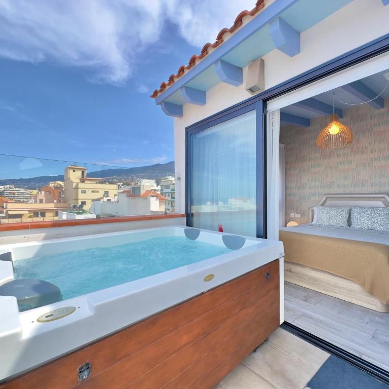 North Coast Apartments - Apartamento Dúplex con jacuzzi y terraza - 1