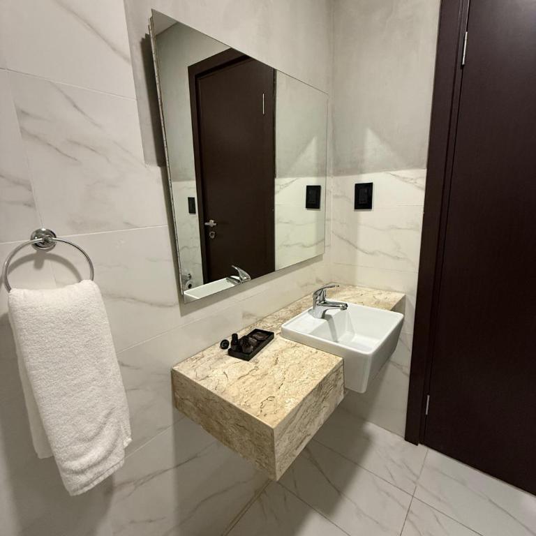 Ramada Suites by Wyndham Asuncion Aeropuerto - Superior Room with One King Bed and Two Single Beds - Non-Smoking - 5