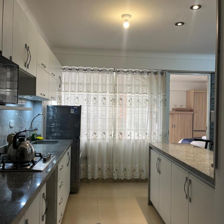 Mini apartment cerca al Ovalo pachacutec - Two-Bedroom Apartment - 19