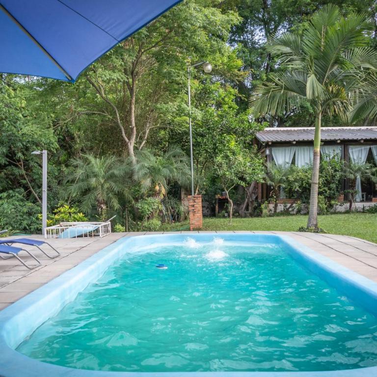 Casa Angi, con jardín y piscina en Sanber - Three-Bedroom House - 41