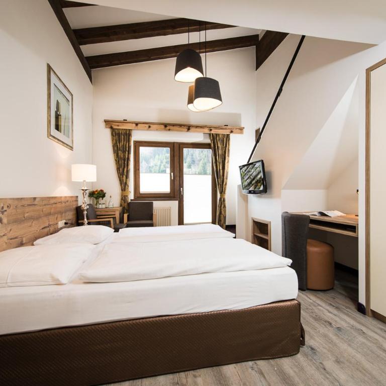 Hotel & Appartements Tiroler Buam - Deluxe Familiensuite - 4
