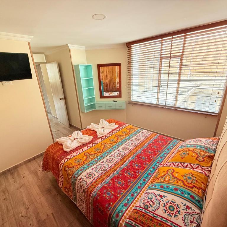 Hospedaje Edificio Alejandria - Apartamento de 2 dormitorios con vistas a la ciudad - 18