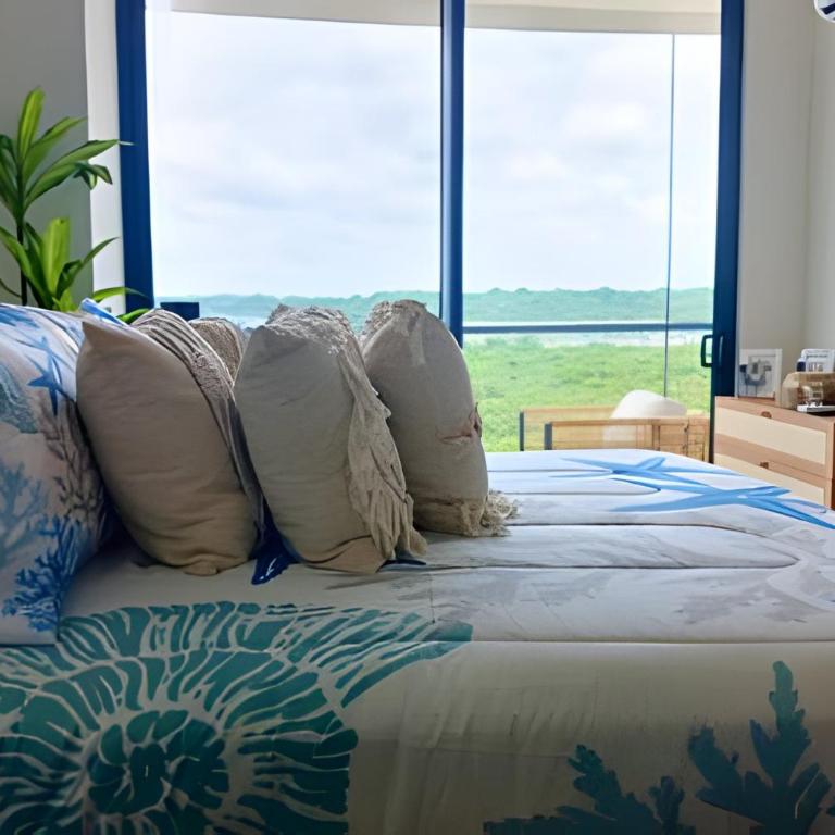 ¡Comodidad y Estilo frente al mar! - Deluxe Two-Bedroom Apartment with Garden View - 7