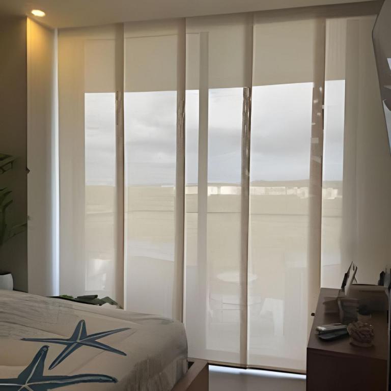 ¡Comodidad y Estilo frente al mar! - Deluxe Two-Bedroom Apartment with Garden View - 9