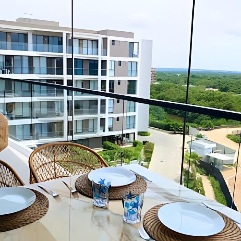 ¡Comodidad y Estilo frente al mar! - Deluxe Two-Bedroom Apartment with Garden View - 20
