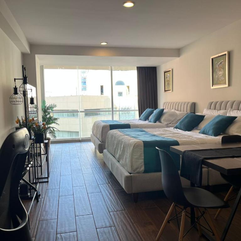 Bellísima Suite, 2 Camas Queen, Gym, en Interlomas - Suite con cama grande y balcón - 13