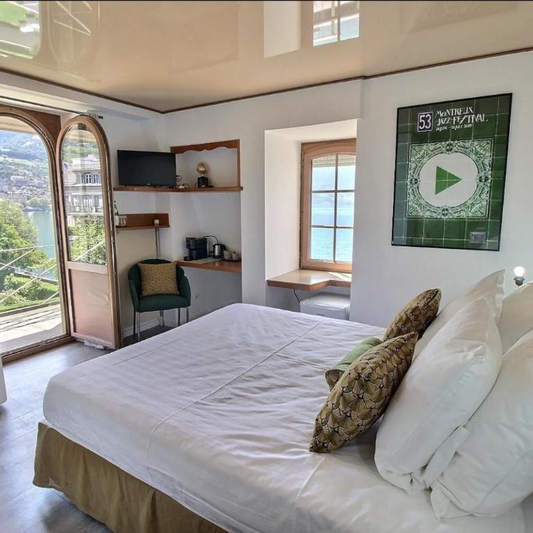 La Villa - Standardzimmer mit Balkon, Garten- und Seeblick - 12