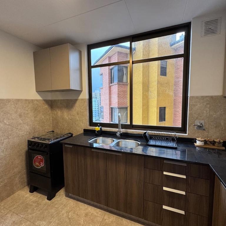 Departamento céntrico, cómodo y con vista panorámica - Apartamento de 2 dormitorios - 10