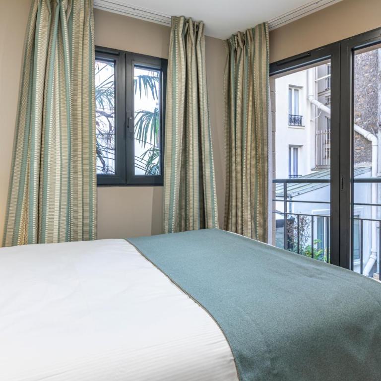 Hôtel Montcalm - Chambre Lit Queen-Size Classique - Vue sur Jardin - 5