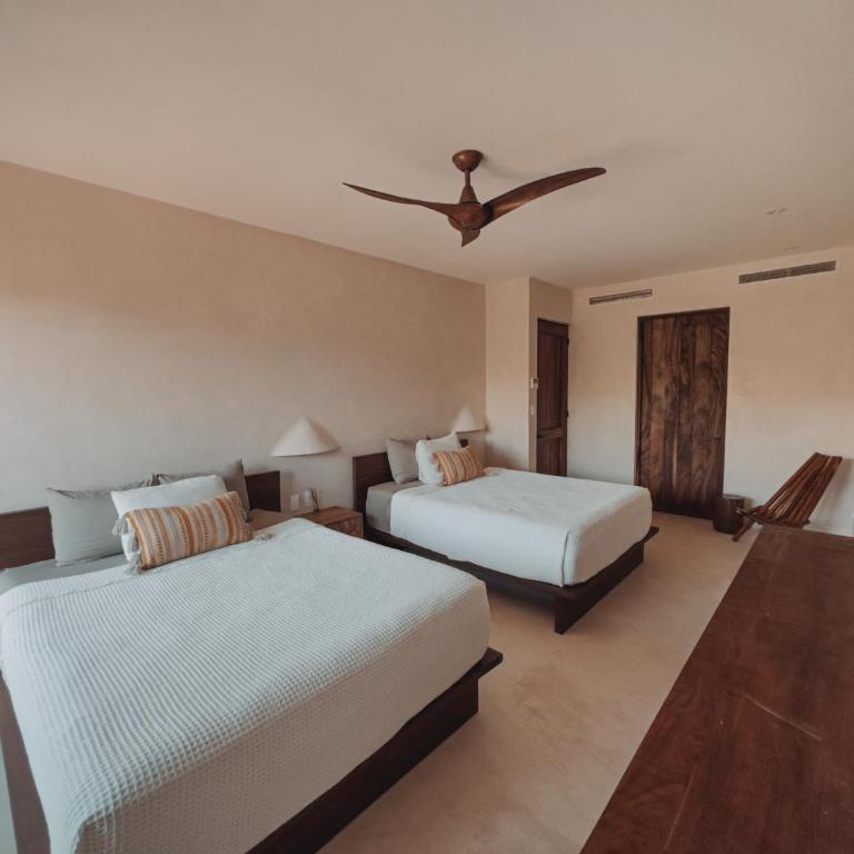 BT Homes - Tulum - Apartamentos modernos con elegancia y serenidad frente al mar - Apartamento con 3 dormitorios - Frente al océano - 17