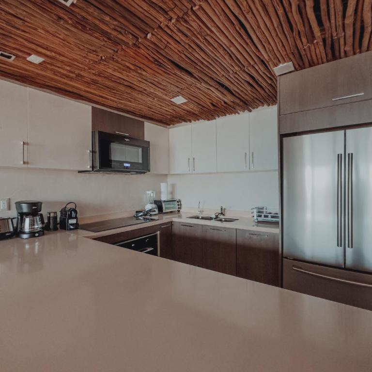 BT Homes - Tulum - Apartamentos modernos con elegancia y serenidad frente al mar - Apartamento con 3 dormitorios - Frente al océano - 16