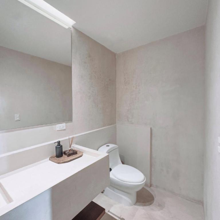 BT Homes - Tulum - Apartamentos modernos con elegancia y serenidad frente al mar - Apartamento con 3 dormitorios - Frente al océano - 9